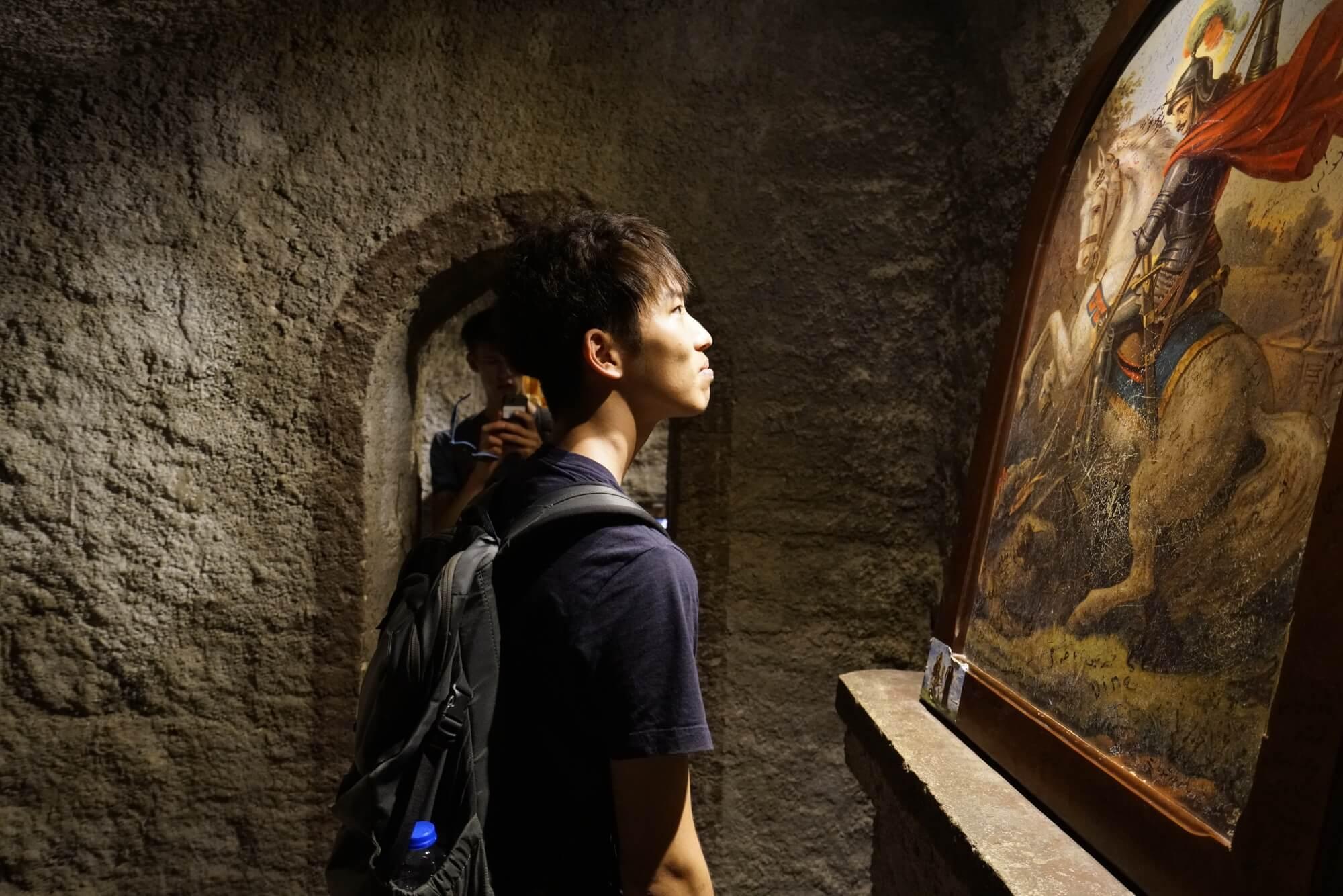 a student and an ancient painting