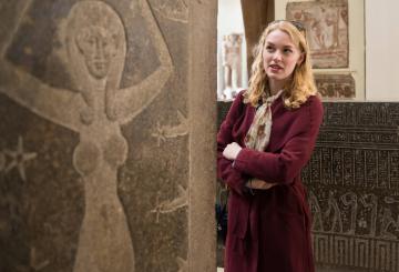 a woman in a museum