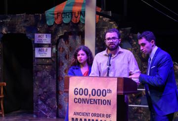 Three actors in the play on stage in Gerhart Theater