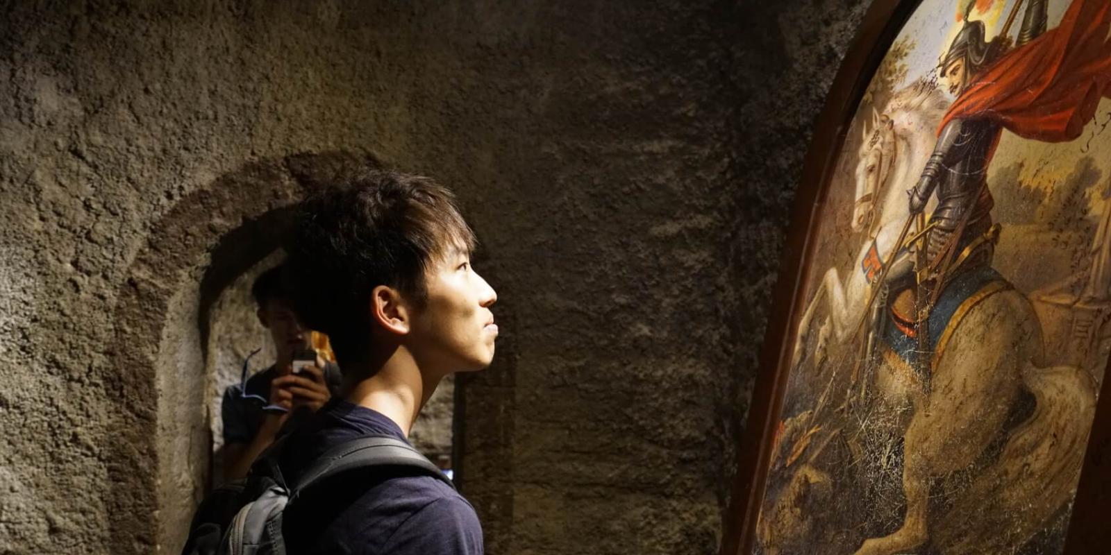 a student and an ancient painting