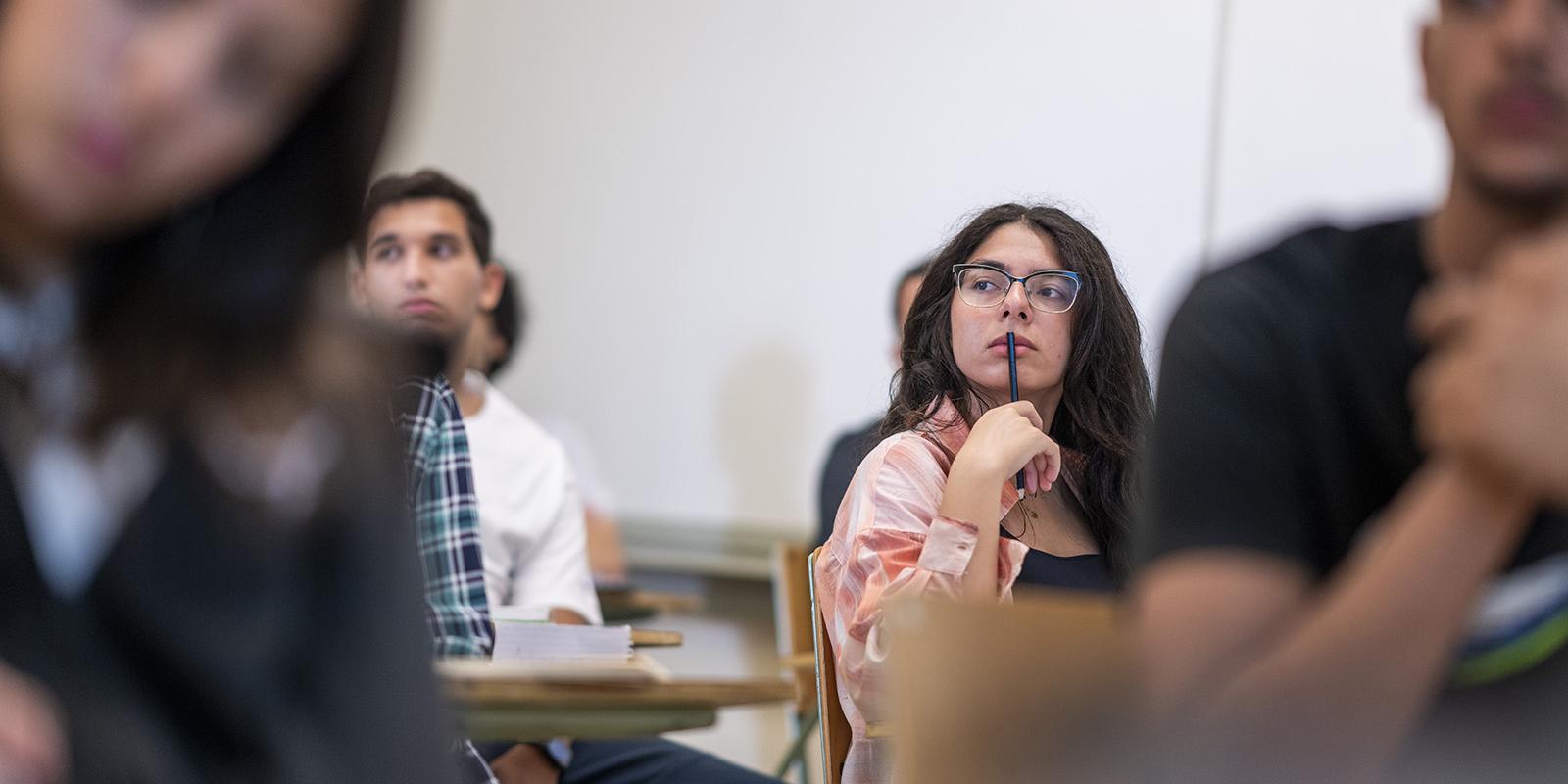 A gril in class thinking