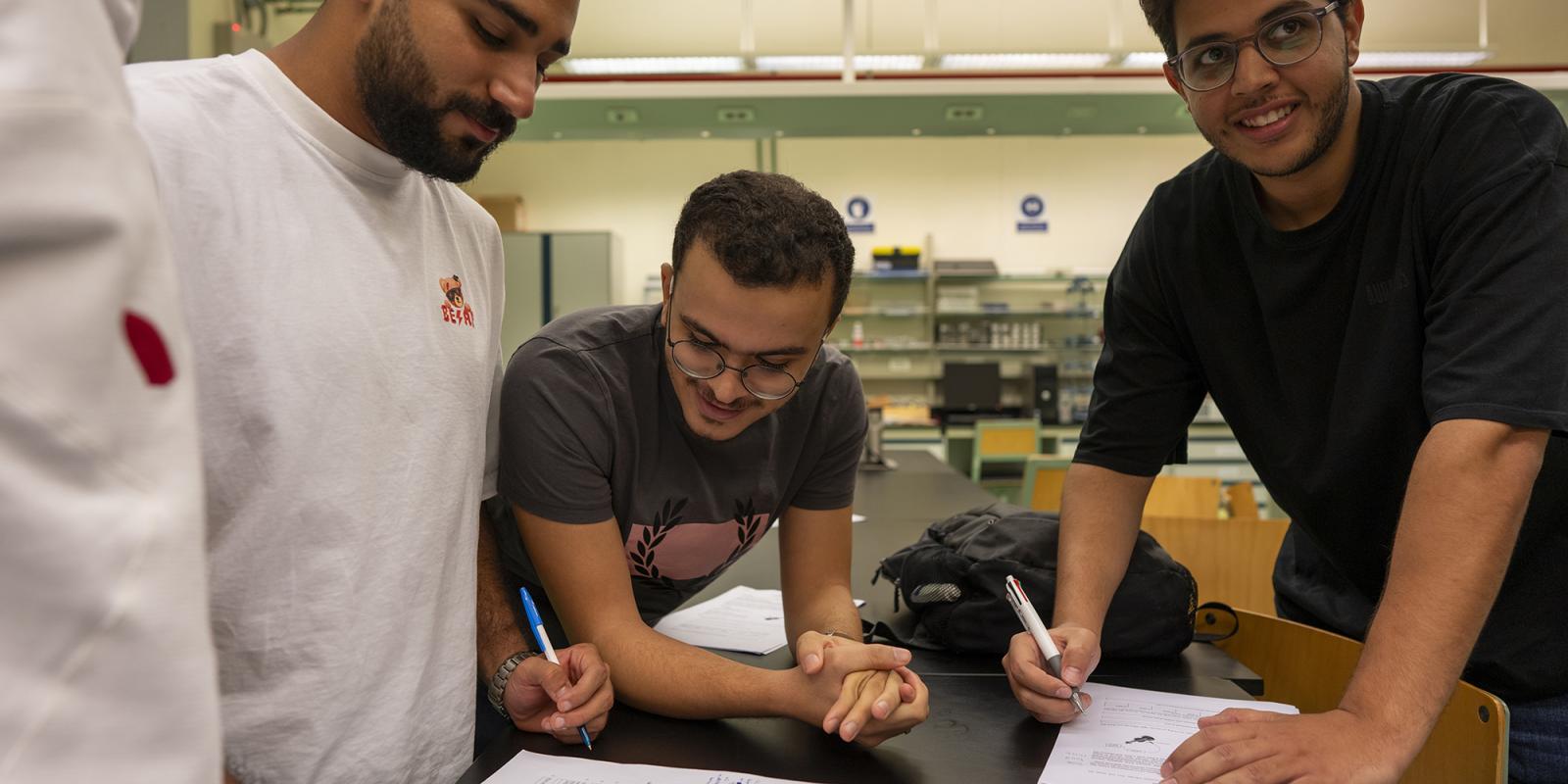 students taking notes in class project