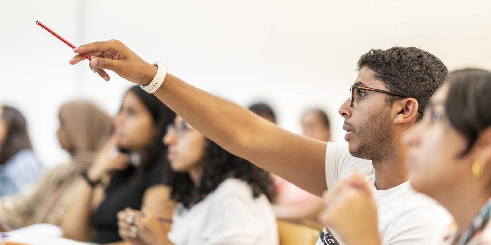 student asking questions in class