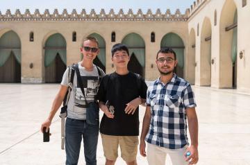 college students on a field trip to an islamic monumental site