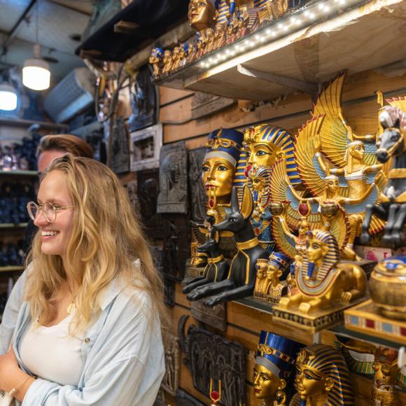 students taking a trip in old cairo and buying ancient egyptian gifts